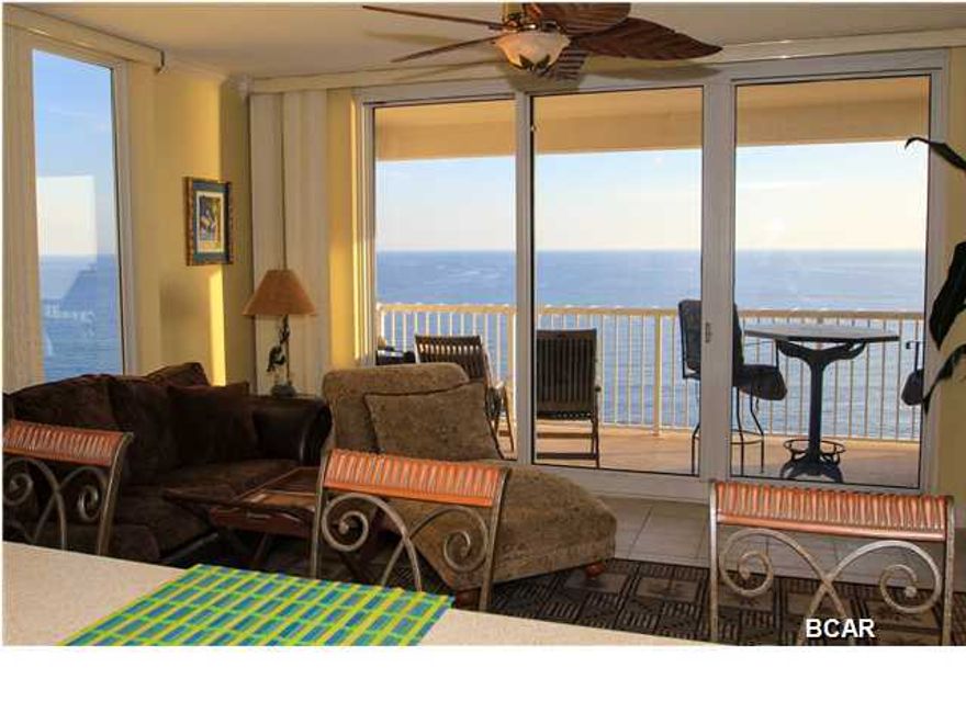 Discover your own private paradise in this 1 bedroom, 1 bath Gulf front Corner unit at Majestic Beach! This unit is full turn-key rental ready with a strong rental history. With breathtaking eastern views of the Gulf, this condo will be your perfect beach getaway featuring GE appliances, 9' ceilings, custom ceiling fans and blinds, and extended tile throughout the living/dining room. Majestic Beach offers resort style amenities including indoor/outdoor pools, tennis, a large outdoor dining area, impressive fitness facility, community room, the Majestic Movie Theatre, the H20 Bar and Grill serving Gulfside lunch and dinner and the Majestic Market featuring Starbucks coffee and gourmet sandwiches, etc. Convenient to shopping and recreation in Pier Park, as well as the new airport.