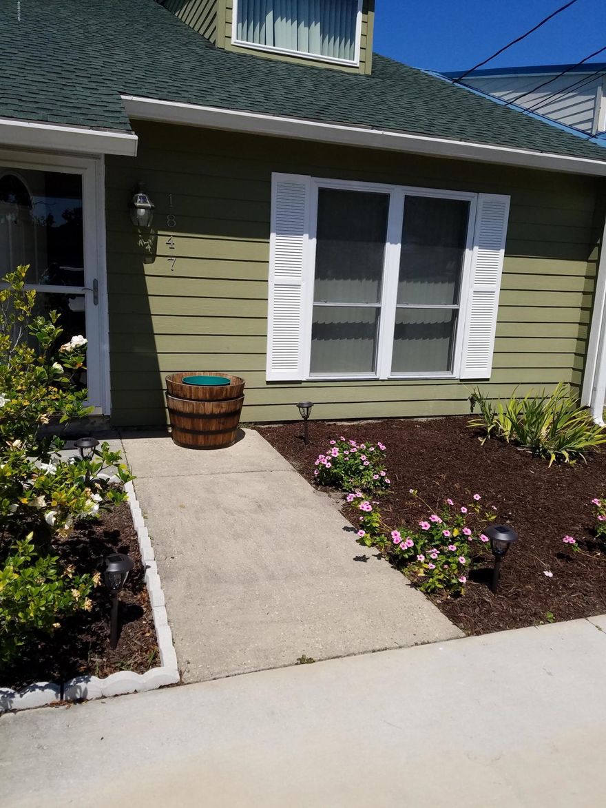 2/2 townhouse in St Andrews.  Convenient to the beach.  Near the Navy Base.  Close to all the restaurants in the Beck Ave area.    Master bedroom upstairs has its own loft.  There is a second bedroom and full bathroom downstairs. Yardcare and Pest Control included.  W/D included. Nice fenced in back yard with covered patio area.  No cats, dogs negotiable, restrictions apply.