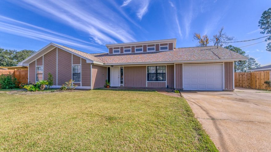 CURRENTLY UNDER CONTRACT, SELLER ACCEPTING BACKUP OFFERS Adorable house close to everything beach - the Navy Base, restaurants, shopping, Pier Park and the world's most beautiful beaches.  With almost 1800 square feet of living space the home also has an enclosed 26x12 porch that is not included in the square footage.  Welcome your guests into the spacious foyer with shiplap accent wall. There are three bedrooms and two baths with a large great room, breakfast area,  dining area and a super cool loft above the kitchen . The great room features a vaulted ceiling, a fireplace with a brick hearth and lots of natural light. The kitchen has butcher block counters, stainless appliances and tile backsplash. A spacious laundry room is off the kitchen. There is a garage in addition to RV parking with sewer cleanout, water and 30 amp power.  The back yard is fully fenced with a storage shed for your lawn or beach equipment and deck for outdoor entertaining. The home has a new roof, new flooring and paint. Make your appointment to see this home today.