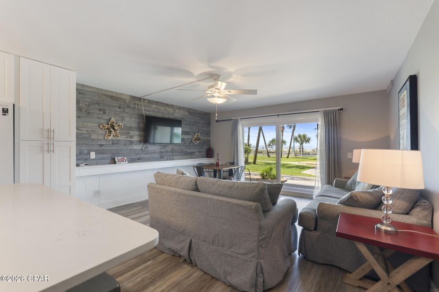 RARE GROUND-FLOOR GULF-FRONT UNIT Welcome to Unit 129 at The Summit, where beautiful Gulf views meet unbeatable convenience with direct access to the sugar-white sands of Panama City Beach. Walk straight from your patio to the pool deck and beach! Perfect for families who want easy access to the beach and resort amenities with no elevators required.

This condo has received over $50,000 IN UPGRADES and improvements (2022-2023) including a new stove, microwave, refrigerator, washer and dryer, HVAC system, updated flooring throughout, and new living room and kitchen furnishings. The resort has also completed exterior improvements including new windows, sliding glass doors, and balcony tile, enhancing both comfort and long-term value.

Inside, the open living space creates a relaxing coastal setting whether you're enjoying morning coffee or unwinding after a day on the beach. The kitchen offers generous counter space and full appliances, while the in-unit washer and dryer add everyday convenience.

The layout comfortably accommodates guests with a private primary bedroom, hallway bunk beds, and a 1.5-bath configuration with tub/shower combination. The condo is approved to sleep up to six guests and is being sold fully furnished and rental ready.

Professionally managed by Azure-Properties with strong rental momentum already in place with approximately $33,000 IN FUTURE RESERVATIONS currently on the books. Ground-floor units like this are highly sought after by guests for their direct pool and beach access.

Owners and guests at The Summit enjoy resort-style amenities including:

• Two large beachfront pools
• Hot tubs and fitness center
• Tennis and basketball courts
• Shuffleboard, picnic, and grilling areas
• Direct beach access
• On-site tiki bar, market, and Bikini Bob's restaurant
• Gated entry with on-site security and ample open parking

Located in the heart of Panama City Beach, just steps from shopping, dining, and entertainment.  Summit Resort is on Thomas Drive near St. Andrews State Park, and walking distance to the massive 30,000-square-foot Tootsie's Orchid Lounge (opening soon).   Other nearby attractions include Ripley's Believe It or Not, WonderWorks, Shipwreck Island Water Park, ZooWorld, Shell Island excursions, Topgolf, Dolly Parton's Pirates Voyage Dinner & Show!

Whether you're searching for a beachfront getaway, second home, or an income-producing investment, this ground-floor Gulf-front unit offers outstanding convenience, strong rental potential, and direct beach access.

All information deemed reliable but not guaranteed. Buyer to verify all information deemed important.