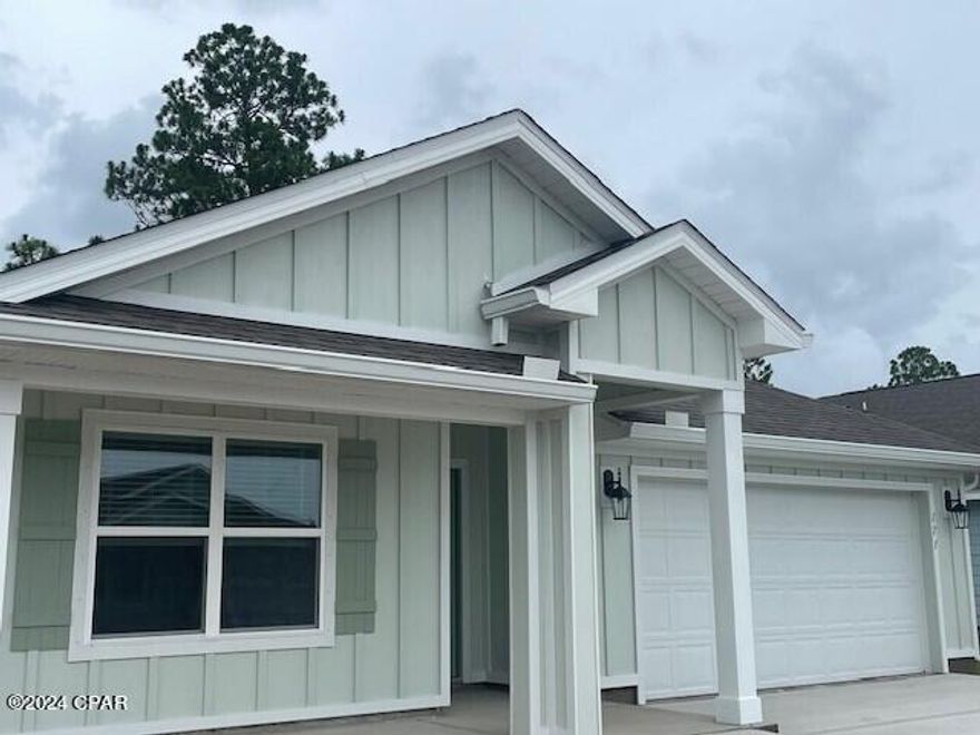 Come see our new construction home at 171 Cades Court located at Palmetto Bluff in Port St. Joe, Florida.  As you enter this 4 bedroom, 2 bath Cali floor plan, you will see 1,787 square feet of spacious living. The interior features 8' ceilings throughout, engineered vinyl plank flooring throughout the home including the bedrooms. Beautiful granite countertops, white cabinetry and a spacious open living room and kitchen make this home perfect for having guests over. The kitchen has a large center island with cabinets underneath, ideal for serving food and extra storage. The kitchen also has a spacious pantry, and the stainless-steel appliances include smooth top range, microwave, and dishwasher.

The primary bedroom has soft carpet and its own bathroom featuring a spacious walk-in closet with ventilated shelving, a double vanity with granite countertops, and a separate shower and tub.

On the outside you will see the soft beach colors on each of the homes with durable Hardi Board around the home. The Cali features a covered rear patio to sit and enjoy the beautiful Florida weather. Each home in Palmetto Bluff has sidewalks that intertwine the community for you to enjoy your walks with the family during the gorgeous sunset views in Port St. Joe.