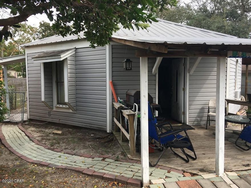 The property has a renovated kitchen with Silestone countertops, stainless steel appliances, oak cabinets, a nice sunroom to relax in. The house also has a Galvalume metal roof. There are 2 storage sheds in the backyard as well. This is a great investment opportunity for adding a vacation rental to your portfolio. If you've been looking for an investment opportunity close to the beach, this could be the one!!!