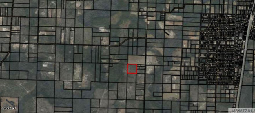 This large wooded, high and dry land is for sale! Access to property is via a neighbor's land, will have written permission for new buyer. Never developed and no wetlands, not in a flood zone. This land is right off of Highway 231 in Fountain and would be a great lot to own! Quiet area. Owner financing available with 30% down.