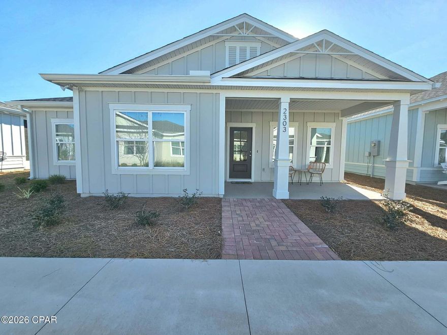 This low-maintenance Florida Cottage is located in the popular waterfront community of SweetBay! Perfect for those ready to spend less time on yard work and more time enjoying the sweet lifestyle SweetBay has to offer.

This open-plan paired home features large covered porches and an attached two-car covered carport. Inside, you'll find granite countertops, stainless steel appliances, and luxury vinyl plank flooring throughout the main living areas. The primary bedroom includes a spacious walk-in closet and a beautifully tiled shower.
The owner has also made several thoughtful upgrades including gutters around the home and an insulated panel roof system over the back porch, along with pavers that extend the outdoor living area -- creating a great space to relax or entertain.
The front of the home overlooks a charming community green space with a sidewalk winding through it, a gazebo that's perfect for gathering and chatting with neighbors, and a playground located just across the street.

SweetBay is a walkable, golf-cart-friendly community offering truly unmatched amenities including a dock with Bay and Gulf access, boat launch for kayaking, a private beach, paddle boarding, fishing, parks, resort-style pool complexes, sports courts, and miles of scenic trails. The Publix-anchored town center -- featuring Starbucks and local dining options -- adds even more convenience to this vibrant coastal neighborhood.

New updated professional photos will be added within the next two weeks.