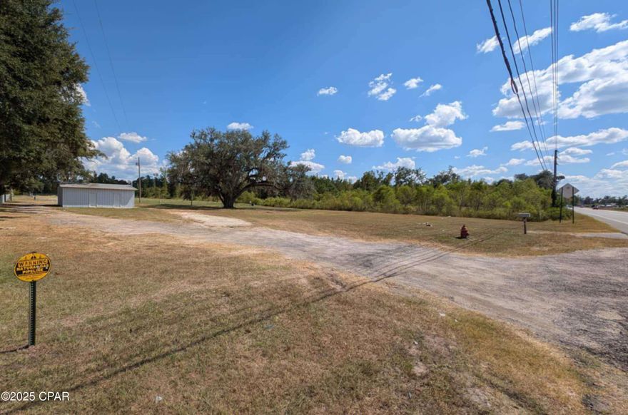 Attention Investors! This 2.93 acre parcel is a ready to develop cleared property that is zoned Commercial & Mixed Use.  It is  located in fast growing Northwest Florida on Highway 71 with 19,500 approximate DTC.  City Water, Sewage, and Utilities are available.  Property is less than 2 miles to Interstate I-10 exit 142.  Property has approximately 195 feet of highway 71 frontage.  Traffic light installation coming soon at Magnolia Road and highway 71 intersection. Raceway Gas Station being built across the 2 lane highway.  Close proximity food and businesses are Chick fil-a, McDonald's, Arby's, Dickey's BBQ, Sonny's BBQ, Wendy's, Popeye's, Burger King, Pizza Hut, Ruby Tuesday, Dairy Queen, Firehouse Subs, Duncan Donuts, Waffle House, Hampton Inn, Motel 8, Motel 6, Days Inn, Comfort Inn, Pilot truck stop, TA truck stop, Walmart, Lowes, and many more.  Property would be a perfect RV park with its location.  There is a small building on the property ready to use, and a retention pond at the east end of the property.  With all the development currently happening in this area and Northwest Florida now is the time to jump.
All property measurements to be confirmed by buyer.