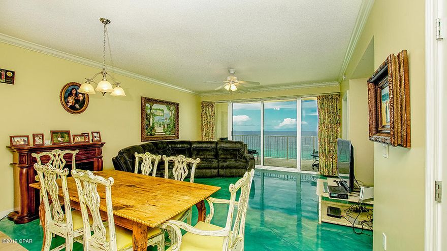 This 14th floor end unit is quite exceptional. It has 3 bedrooms plus a bunk room. One of the bedrooms is a lock-out that is self-sufficient including a kitchenette & private balcony. The condo has just had the kitchen remodeled and concrete floors stained. This unit features granite counter tops--high ceilings w/crown molding--garden tub w/separate shower in master bath; washer & dryer; a huge balcony for enjoying the spectacular views of the sugar white beach.