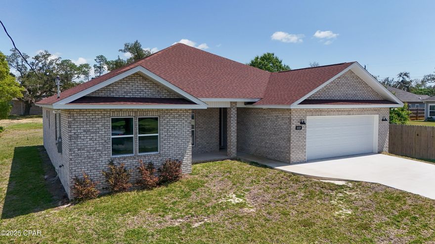 New Construction - All Brick 4BR/2.5BA Custom Home in Lynn Haven | 2,350 Sq Ft

Beautifully designed and newly built, this 4-bedroom, 2.5-bathroom all-brick custom home offers 2,036 sq ft of living space on a wonderful lot in the desirable community of Lynn Haven.  During construction, every exterior wall and every square inch of the roof was coated with foam insulation.  Yes, even the attic area is insulated from the summer heat, making this one of the most energy-efficient homes available.  The home features a 10-foot tray ceiling in the living room, a 9-foot tray ceiling in the master suite, and 9-foot ceilings throughout. Interior finishes include luxury vinyl plank flooring in main areas and bedrooms, with tile flooring in all bathrooms.  The kitchen is a standout, showcasing a large island, pantry, abundant cabinetry, and beautiful hard-surfaced countertops—perfect for everyday living and entertaining. The master suite includes a custom tile shower, double vanities, and a spacious walk-in closet.  An oversized 24' x 24' garage provides plenty of space for vehicles and storage.  The attic above the garage is decked and serves as another storage area.  Enjoy the outdoors from the covered patio, featuring an extended wooden deck that provides even more room to relax or host guests.  No HOA. Convenient to top-rated schools, parks, shopping, and the bay. This is high-quality new construction with thoughtful upgrades throughout—schedule your private showing today!

Measurements are approximate.