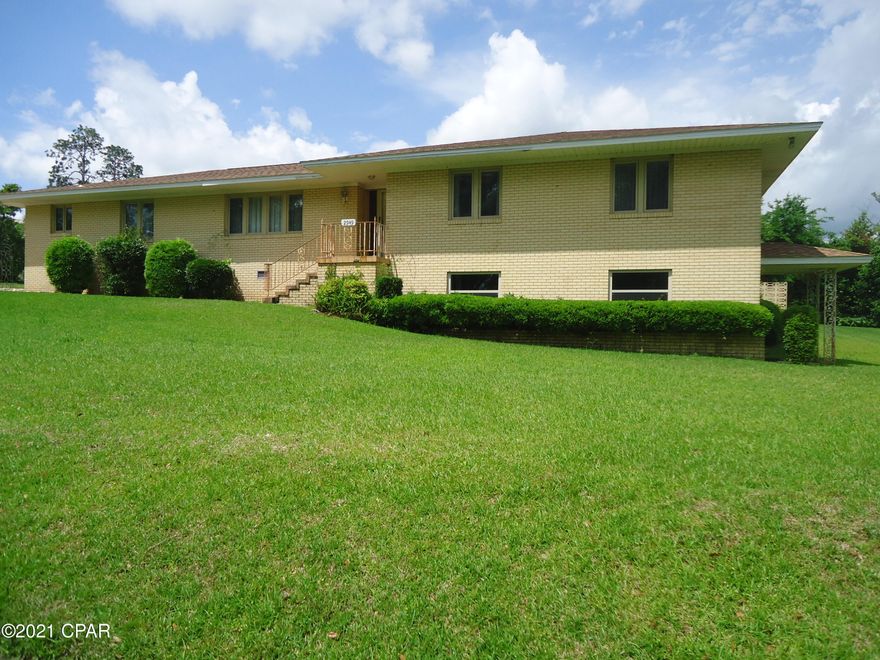Live within blocks of downtown Marianna in this 4 bedroom 2 bath brick home located on 

 a beautiful corner lot.  There's  plenty of room for a growing family.  Formal Living and Dining rooms, craft room, den and a basement.  There's hardwood flooring in most of the house. If you don't mind a little updating, this is the home to see!
