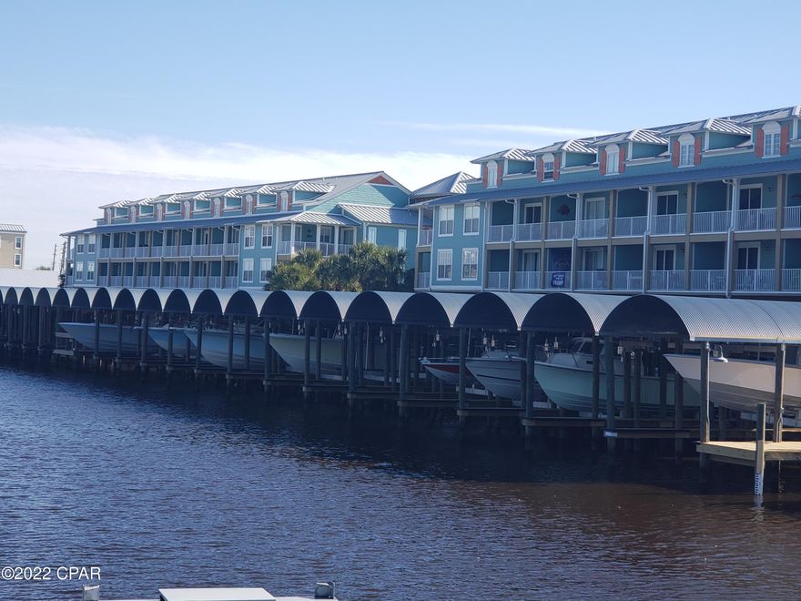 CURRENTLY UNDER CONTRACT, SELLER ACCEPTING BACKUP OFFERS. Beautiful, freshly renovated 1 bedroom 2 bath condo in Mexico Beach with covered BOAT SLIP. New everything, Appliances, landscaping, parking lot, boat slips, furniture, AC, light fixtures, plumbing fixtures, etc! This unit is better than new! This unique, custom floor plan sleeps 4 comfortably. The unit is sold fully furnished! Located on the canal this development is a favorite for serious boaters and fishermen. The Covered boat slip has running water and electricity and is large enough to accommodate approximately a 40' boat.This West End Harbour unit has 2 car covered parking with a large storage room perfect to store your gear, refrigerator and freezer. The Storage Room opens to the boat slips for quick, and easy loading. This location makes for easy access to the Gulf of Mexico.Great pool, hot tub, sunbathing and BBQ grills privately located on site! The Marina store is located next door for fuel and supplies, this is a fisherman's dream.