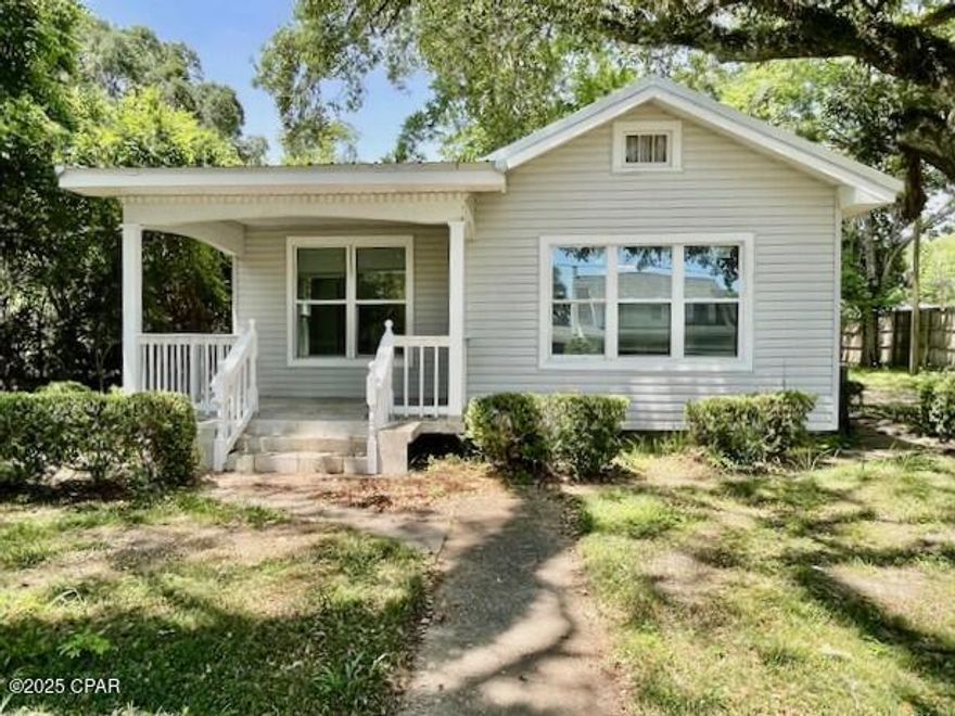 * SELLER MOTIVATED *  Exquisitely updated home and detached apartment in lovely Graceville, Florida.   The yard is graced with beautiful majestic oaks.  The main house has a large living area just right for entertaining.  The large kitchen has lots of cabinets and storage area.  A nice feature is the large master bedroom that has a fireplace.  There is a covered front porch with new tiled floor and there also is a nice side porch.  In the back yard you have the apartment that has a large living/bedroom combo area and there is a kitchen and a​​‌​​​​‌​‌​​​​‌​​‌​​​​‌‌ bathroom.