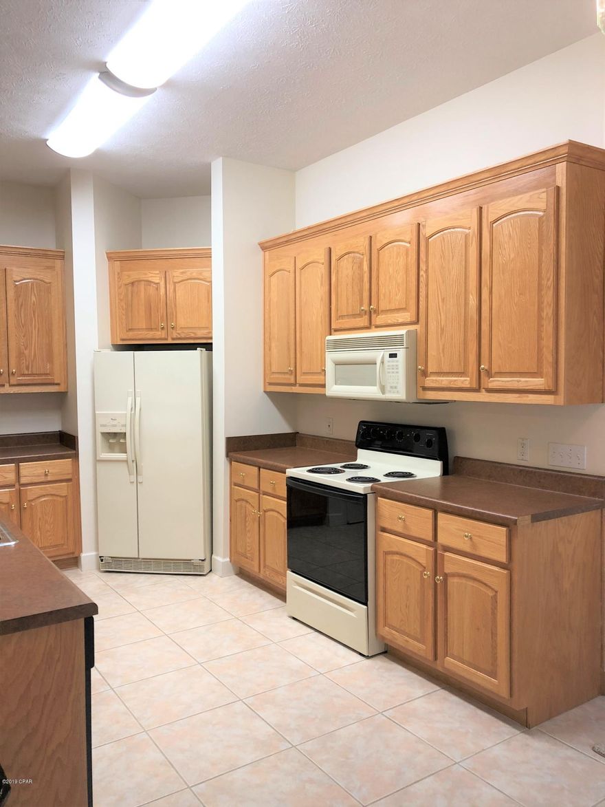 Beautiful spacious 4 BR 3 BATH home in the prestigious Woods Subdivision, close to shopping, restaurants ,Medical center ,entertainment and only 15 minutes to the BEACH!!. Home has open floor plan, Kitchen with breakfast bar. and family room with gas fireplace Formal living and dining room. Master bath features a spa tub and separate shower. Split bedroom floor plan with large screened porch on back.