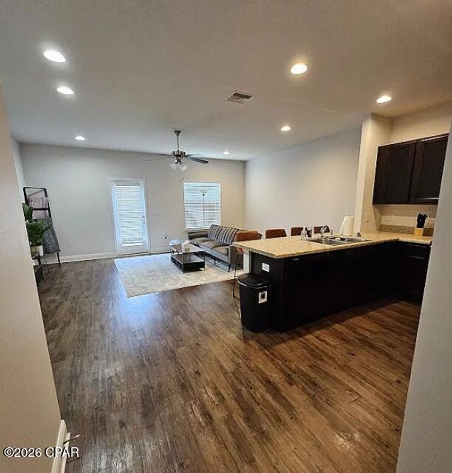 This 3-bedroom, 2.5-bath townhome with a one-car garage is a prime investment opportunity in Sentinel Pointe. With a renter already in place, enjoy immediate rental income with minimal hassle. Property Features: Spacious Layout: Three bedrooms, 2.5 baths, and an attached garage. Modern Appliances: Includes stove, refrigerator, dishwasher, and built-in microwave. 

Low-Maintenance Living: HOA covers lawn care, exterior maintenance, garbage pickup, and access to the community swimming pool. Prime Location: Conveniently near shopping, fitness centers, Tyndall Air Force Base, Eastern Shipyard, hospitals, and coffee shops. A hassle-free investment property in a high-demand rental area!