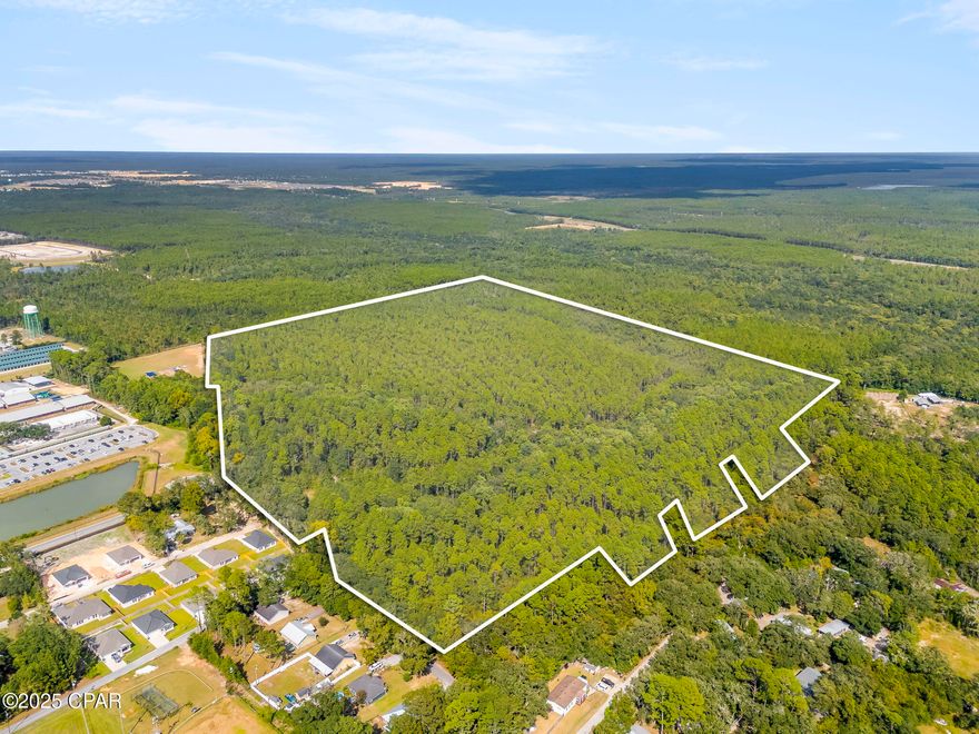 CURRENTLY UNDER CONTRACT, SELLER WILL CONSIDER BACKUP OFFERS: Exceptional opportunity in the heart of Freeport! This expansive 71.93-acre parcel is just minutes from the major intersection of Hwy 331 and Hwy 20, offering quick access to shopping, schools, and regional employers in one of Northwest Florida's fastest-growing communities. The property is well-suited for residential development or estate homesites, surrounded by both established neighborhoods and new growth. Families will appreciate the proximity to Freeport Elementary, Middle, and High Schools, as well as convenient shopping and dining options including Publix, Ace Hardware, and local restaurants. Outdoor and recreational amenities abound—Windswept Dunes Golf Course is just down the road, while Choctawhatchee Bay and the Freeport Regional Sports Complex provide year-round activities. The renowned beaches of Scenic 30-A are less than 20 minutes away, placing world-class Gulf beaches, dining, and shopping within easy reach. Strategically located, the property is only 25 minutes to Niceville, 35 minutes to Destin-Fort Walton Beach Airport (VPS), approximately 20 minutes to Ascension Sacred Heart Medical Center in Miramar Beach, and about 45 minutes to Northwest Florida Beaches International Airport (ECP) in Panama City Beach. According to the City of Freeport Planning and Zoning maps, the property's Future Land Use is designated as Low Density Residential (LDR) and its current Zoning is Residential-1 (R1). For buyer convenience, copies of Freeport's Water Distribution System and Wastewater Collection System maps have been uploaded under the 'Photos' and 'Documents' sections of this listing. With its prime location, acreage, and the continued growth of Freeport, this property presents a rare and strategic opportunity for developers, builders, investors, or those seeking a large private tract near the coast. Thank you for considering this property!
