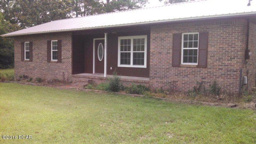 Very nice brick home with a new metal roof. Three bedroom and two full bathrooms. A large laundry room. The house has been recently renovated with all new counter tops and appliances, cabinets have been updated with new finish and handles and hinges, new floor covering thru out the house, new paint and window trim, new sinks and bathroom fixtures. A new well on the property as well as a new pole barn with one side cement floored and enclosed with metal siding. A new metal awning has also been erected for ease of parking access to house or to just relax under.