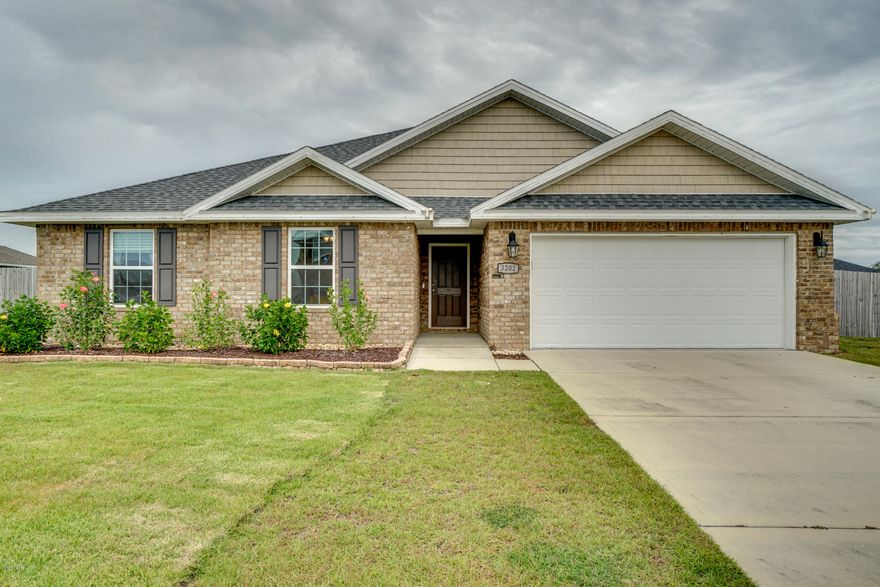 Check out this beautiful 4 bedroom, 2 bath home with a huge corner lot in the Magnolia HIlls Subdivision.  Magnolia Hills is conveniently located just off of Hwy 231 and Transmitter Rd. The exterior of this home offers plenty of space for a pool, garden, or workshop in the privacy fenced back yard and a great covered patio for afternoon lounging. This is one of the few newer homes with a large lot in Bay County and it's one of the largest lots in this particular neighborhood.  The interior of the home offers a great open, split bedroom floor plan with TONS of large closets and storage space.  In the kitchen you will find a nice size pantry, granite countertops, stainless steel appliances and a large island giving you tons of counter space that overlooks the living room. The master bedroom is HUGE with its own ensuite bath with double vanity sinks, large walk in closet, and walk in shower. There are 2 additional bedrooms on 1 side of the home that are both good sizes and a 4th room on the other side of the home that could be used as a bedroom or office. If you are looking for lots of storage space, living space, on a large lot, then this is the home for you. Call your Realtor today.