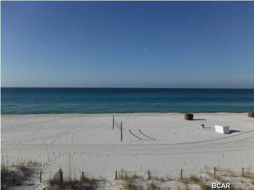 Gulf Front, one bedroom with bunks and private balcony overlooking the beautiful white sands of Panama City Beach. This recently renovated one bedroom condominium is fully furnished, with updated appliances, kitchen back splash, and bathroom tile. This is also the only unit in the complex with a bunk area! Walking distance to Pier Park, Sharky's, Margarettaville, movie theaters, shopping and restaurants. This unit is on the third floor with absolutely nothing blocking your view of the gulf! You are high enough for privacy but low enough for convenience. The perfect location, perfect size and perfect view. Note that the association fee includes everything - including unit Electricity, Water, Cable, Internet and Phone among other items. Note - this is the only one bedroom that has