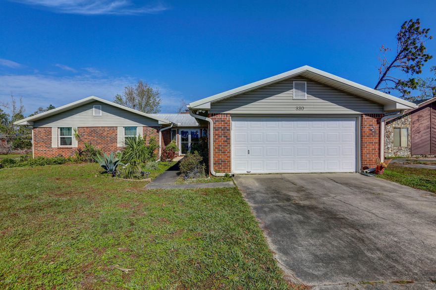 Great well-built 3/2 home in a great location and excellent neighborhood. It has a beautiful gas/wood burning fireplace. The kitchen has new cabinets and a breakfast bar. There is dimmer lights throughout the house including in the hallway bathroom! New windows have been installed also comes with hurricane shutters. It has a metal roof and all new tile floors. It has a screened-in porch and a patio! There is a 12x24 shed that is wired and can be hooked up to electricity.