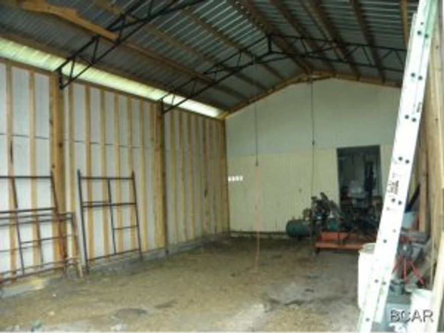 12 plus acres this close to town is a rare find AND with a 20x42 enclosed pole barn with 12' walls, metal roof, 100' deep well & 8x8 pump house. Would make a magnificent mini farm. Plenty of deer and dirt bike track. Sits in between 2 paved roads with a gate at each entrance. Seller is open to exchanging. Seller willing to divide and sell 6 acres without the building for $69,900.00. This will be with Jaycee Rd/Jody Ln access.