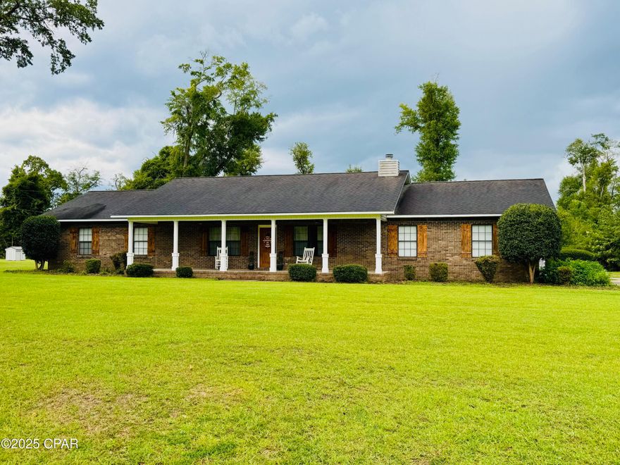 **UNDER CONTRACT, ACCEPTING BACK UP OFFERS**
 (Kick out clause in effect) So take a look!
A must see modern farmhouse home in one of the most desired subdivisions in Marianna, FL. Renovated it 2016. It features a large living room, a spacious kitchen with breakfast area, a separate dining room, 3 large bedrooms, 2.5 baths, and a large laundry room complete with custom built in pantry and linen closet. Updates in 2016 include: Roof, AC, Exterior Vinyl, screened porch, exterior doors, interior doors and hardware, hot water heater, appliances and hood, toilets,  tile throughout home, carpet in bedrooms, tiled shower with seamless glass door, tub with tiled surround, complete custom cabinets & vanities with Quartzite Countertops, columns on front porch, drain lines & 500 sq ft of drain field for septic tank, and landscaping. The garage is heated and cooled and has been converted into a multi-purpose media room/flex space, which can easily be converted back to a garage, if so desired. Additional storage exists in the back yard with a 10'X20' storage shed and barn to store your boat, equipment, or any of your toys. Close to everything Marianna offers and golf course.