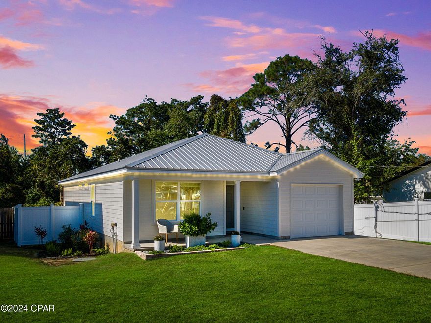 CURRENTLY UNDER CONTRACT, SELLER WILL CONSIDER BACKUP OFFERS            
Welcome to your dream beach getaway! Just 0.5 miles (a quick 2-minute drive or 10 minutes walk) from the pristine sands of Panama City Beach Access 24, this meticulously maintained cottage offers the perfect blend of modern luxury, thoughtful upgrades, and coastal charm. Lovingly cared for and occupied by the original buyers, the home has been upgraded with a thoughtful list of high-end features, ensuring both comfort and convenience.

Smart Home Technology: This home is equipped with the latest smart tech to make your life easier and more efficient, including an LG ThinQ Smart Kitchen Appliance Package (purchased March 2024), Google Nest Protect Smoke & CO Detectors, Google Nest Learning Thermostat, Rachio Smart Irrigation Control System, WiFi-enabled Motion Flood Lamps, Govee Outdoor Programmable Soffit Lighting, and WiFi-enabled Kitchen Lighting.
  
Stylish Interiors: Step inside to discover a beautifully designed space featuring designer lighting throughout, solid wood cabinetry with designer hardware, granite countertops, and an eye-catching scalloped mosaic kitchen backsplash. Enjoy the convenience of a custom coffee bar with an under-counter beverage cooler. The walls are adorned with shiplap and solid wood feature accents throughout, giving the home a warm, inviting feel.

Outdoor Living: Enjoy the outdoors with a fenced rear yard (one backup replacement panel included with the sale), a convenient outdoor shower with handheld wand, and ample space for relaxation or entertaining. You'll love the fresh exterior paint (completed in October 2024) and thoughtful upgrades including a custom imported steel mailbox and brass exterior accent lighting. The home is also equipped with pre-cut removable hurricane shutters for peace of mind and lower insurance cost.

Bonus Features: The additional fridge/freezer in the garage (included with the sale) adds extra convenience for families or those who love to entertain.

Perfect for Investors & Families: This home is not only a fantastic primary residence or vacation retreat but also an incredible investment opportunity. With no HOA or short-term rental restrictions, you have the flexibility to rent out the property when you're not using it. Projected annual short-term rental revenue is approximately $50,000, offering an above-average ROI. 

Located just one block outside the city limits means no city tax and less restrictive building and zoning regulations.

Whether you're looking for a full-time home, a vacation property, or a lucrative short-term rental investment, this house offers it all!