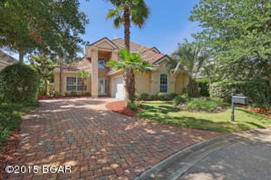 Stunning updated home located within the gated golf course community of Regatta Bay. As you enter the front door you will be impressed by the vaulted ceilings, tile floors and custom wood features that have been added to the home. First floor offers an office with custom shelving, master suite, open living area with breakfast nook, kitchen, separate dining area, laundry and 2 car garage with a screened in porch. 2nd floor has an open area for entertainment with mini bar area and 2 additional bedrooms with 2 baths.