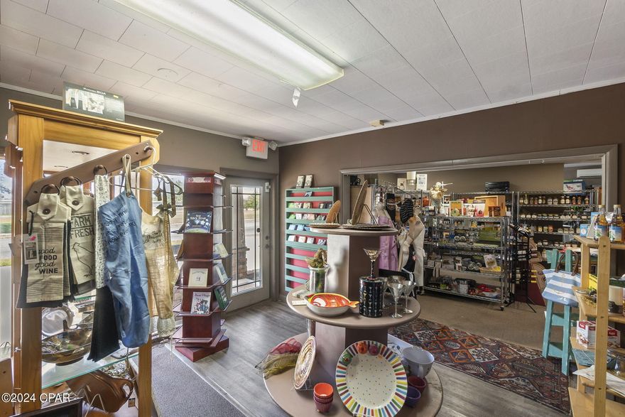 As the iconic Somethin's Cookin' prepares to embark on an exciting new chapter in a Historic Downtown Panama City location, their current address becomes available for purchase. This 3,315 square foot building boasts ample parking, including front and rear parking. The space would be well served as a small catering kitchen, a simple lunch spot, or an easy conversion to professional office or retail.