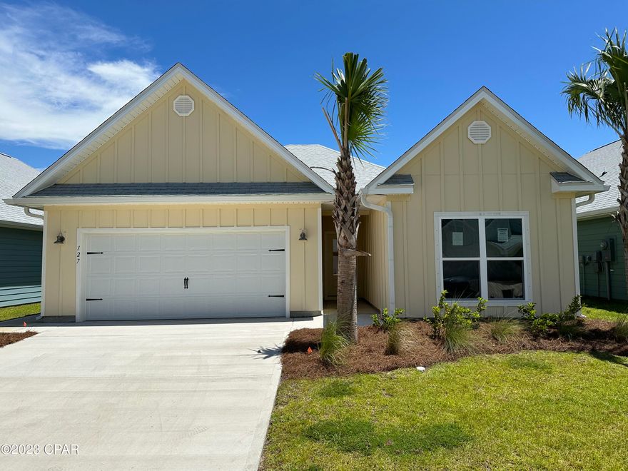 The Kennedy is a 4-bedroom, 3-bath home with 2197 square feet of living space located in WindMark Beach. Standard features of this home include beautiful quartz countertops with undermount sinks in the kitchen and all bathrooms, 5 panel wood doors, engineered vinyl plank flooring throughout the entire home and 9-foot ceilings throughout. Stainless steel appliances included are a free-standing smooth top range, microwave, and dishwasher. The kitchen features a large walk-in pantry, disposal and water filtration system. This unique floor plan features a mother-in-law suite complete with its own entrance, kitchen, bedroom, bathroom, heating and cooling and laundry. WindMark Beach is a tranquil community where one can enjoy the natural settings with boardwalks, walking paths, bike trails, and deeded beach access. WindMark Beach also offers residents numerous luxury amenities and features including a community pool, a gym, restaurants, packaging store/bar, beach equipment rentals, roving security, community fire pit, local shopping, and a versatile community center. EVP flooring throughout the entire home, 9-foot ceilings throughout. Stainless steel appliances included in both kitchens are a free-standing smooth top range, microwave, and dishwasher.  This home also includes a disposal and water filtration system in the Kitchen.  WindMark Beach is a tranquil community where one can enjoy the natural settings with boardwalks, walking paths, bike trails, and deeded beach access. WindMark Beach also offers residents numerous luxury amenities and features including a community pool, a gym, restaurants, packaging store/bar, beach equipment rentals, community fire pit, local shopping, and a versatile community center.   Images, descriptions, SF and room sizes are approximate.