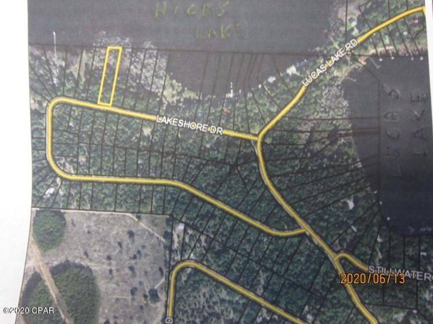 Lakefront lot on Hicks Lake with 100 ft road frontage on Lakeshsore Dr and 101 ft frontage at the lake.  Lot is presently wooded and willl need some cleanup.  One of a very few lakefront lots available in the area.