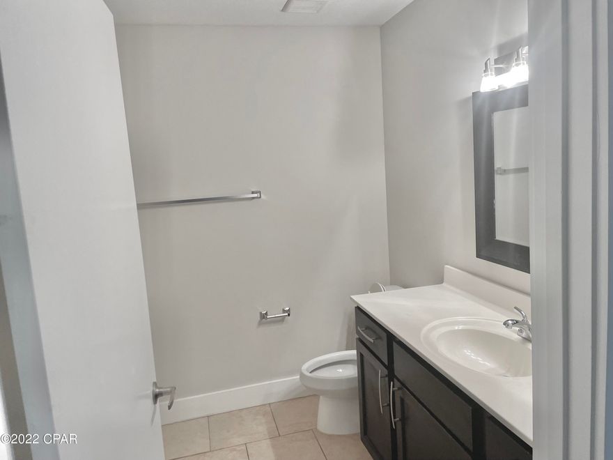 Tucked in the gated community of Marlin Place, this two-story coastal cottage is conveniently located featuring high ceilings, open main living areas with tile floors and tranquil porches for unwinding outdoors. Investors or those looking for a 2nd home, can enjoy either short term rentals for beach goers or long-term residency. Well maintained, new carpet has been added in the bedrooms and upstairs area and interior walls and trim have been refreshed with new paint. Offering a split floor plan, the master suite is located on the first floor and includes a walk-in closet and private bath with access to an outdoor porch and small fenced in yard, while two bedrooms on the second floor provide additional accommodations. Residents enjoy access to a community pool with homeowner dues covering front lawn care, pool maintenance, garbage, and the security gate. Ideally located just minutes to the nearby naval base, St. Andrews State Park, shopping, entertainment, fine dining and best of all, our beautiful Emerald Coast beaches. Call today for a showing.
Buyer should verify all data and dimensions.