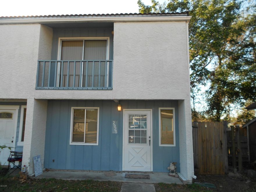 BEST PRICED HOME ON THE BEACH WITH NO HOA FEES (other than mobile homes) * END UNIT IN 4 UNIT COMPLEX * TILE ROOF * NO SEWER COST * BEST PRICED HOME ON THE BEACH WITH NO HOA FEES End unit with large back yard. Five minute walk to the beach and very convenient to navy base, restaurants and shopping. Great for a couple or rental property. 2 bedrooms 1 bath upstairs. Living, dining, kitchen and 1/5 bath on main level. Covered rear patio with storage room. Balcony off master. Has been a second home for years with little use. Being sold (AS IS) Unfurnished. Back yard new  fencing. lot is 200 feet deep. approx. 50+ behind fence. All 4 units share a common septic system. NO Monthly Sewer cost, or HOA fees.