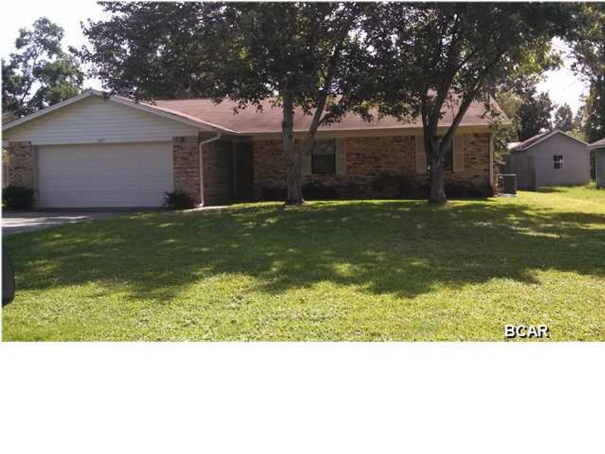 3 BEDROOM, 2 BATH BRICK HOME. 2 CAR GARAGE, FIREPLACE (WOOD BURNING), VAULTED CEILING, COVERED PATIO, WORKSHOP AND PRIVACY FENCED YARD. CLOSE TO TAFB.