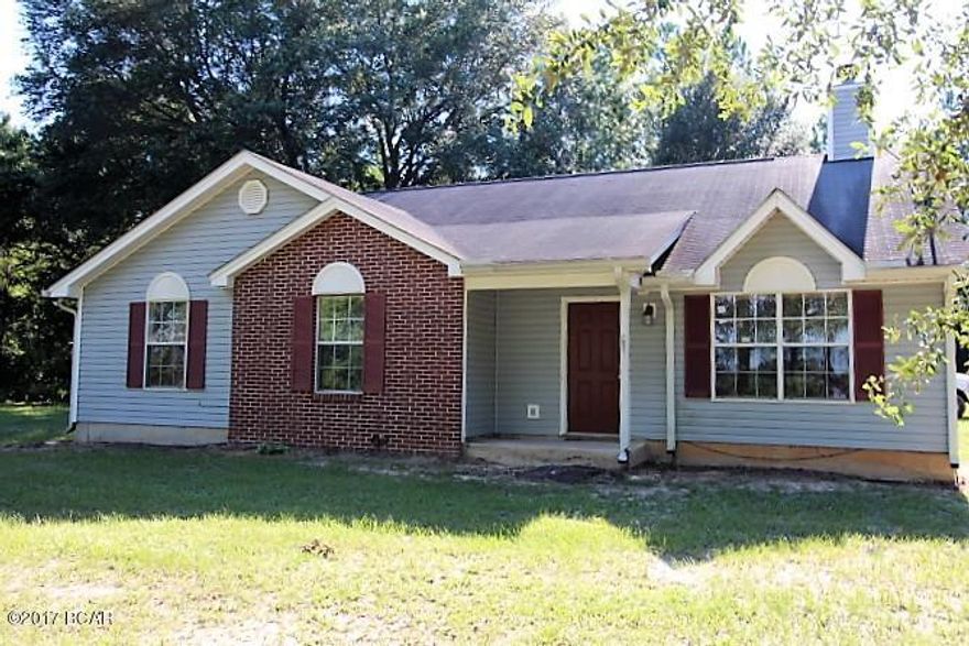 PRICE REDUCED!!    This is a lovely home in a very quiet and peaceful setting just south of Bristol, Fl.  The area is known for it's great fishing lakes and National Forest where wildlife abounds!   The home has 3 bedrooms, 2 baths, a large living room with fireplace and a wonderful fully furnished kitchen with  side-by-side refrigerator/freezer, smooth surface range, dishwasher and there is a washer and dryer.