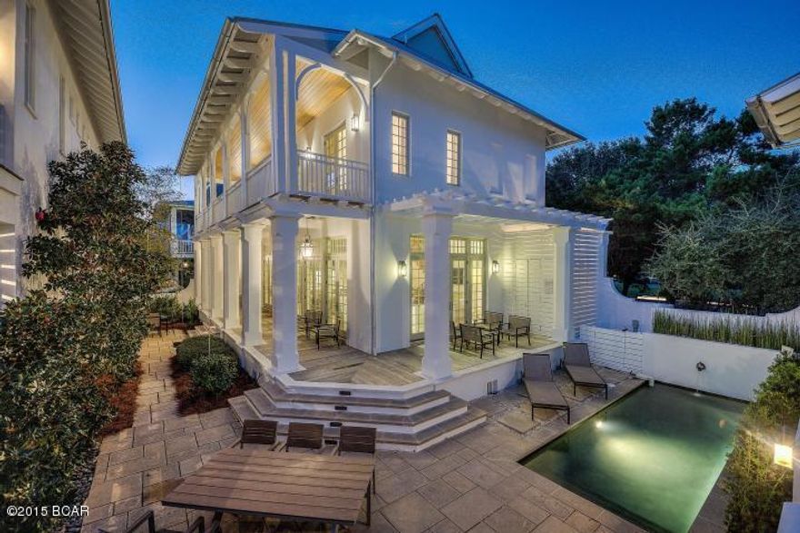 Located on the beach side of iconic Rosemary Beach, this stylish residence brings new meaning to term casual luxury. A large open living space with multiple French doors open onto ipe porches that step down to the private courtyard with heated pool, dining area, summer kitchen & fireplace. A 1st floor master suite rounds out the main living space. The 2nd level features another master suite, a 2nd guest suite & a 2 person office all of which opens on to a deck overlooking the courtyard. The unique 3rd floor boast a 8 person bunk area, a large lounge area & a full bath. A full 1 bedroom apartment in the carriage house rounds out the spaces. As a full time residence, the property has everything a buyer would desire. As an investment, the property generates over $250,000 in income. Designed by Domin Bock, the finishes through are 2nd to none; lighting by Cira, antique Tennessee tobacco barn beams span the main living space. A 48" wolf range with an integral vent hood, 2 Subzero Refrigerators, Calacatta Marble Counter tops, a large eat-in island & butler's pantry with a wine cooler and espresso machine are the perfect additions to the kitchen. 

The 1st floor master is accented with a Lueters Limestone walk-in shower. Forged iron hand rails ascend towards the second floor and third floor and Antique Tennessee Tobacco Drying Barn Wood floors follow. The beautifully furnished 2nd floor master suite is a retreat within itself with private balcony access and custom wardrobe cabinetry. The master bathroom is adorned with a Brizo/Victoria & Albert Tub, Crema Marfil Marble, and a custom walk in closet with pull down clothing rods. Centered on the second floor is an office with double desks, a laundry room equipped with GE Spacemaker Unitized Electric Washer & Dryer which is inconspicuous behind tall cabinet doors. To the east of the second floor is a 2nd guest room with balcony access and separate bath across the hall. Enormous architecturally aesthetic windows illuminate the way to the 3rd floor bunk room and media lounge. 

A carriage house sits to the east of the home through the courtyard above the two car garage. This one bedroom/one bathroom carriage house is the prefect private retrea and is fully equipped with a GE SS Profile 30" slide in electrical range, GE profile Spacemaker over the range microwave, GE SS side-by-side energy star refrigerator, and a GE Spacemaker unitized electronic washer & dryer. 

The entire home utilizes an audio/visual system by Nuvo with nd control panels located in every room.