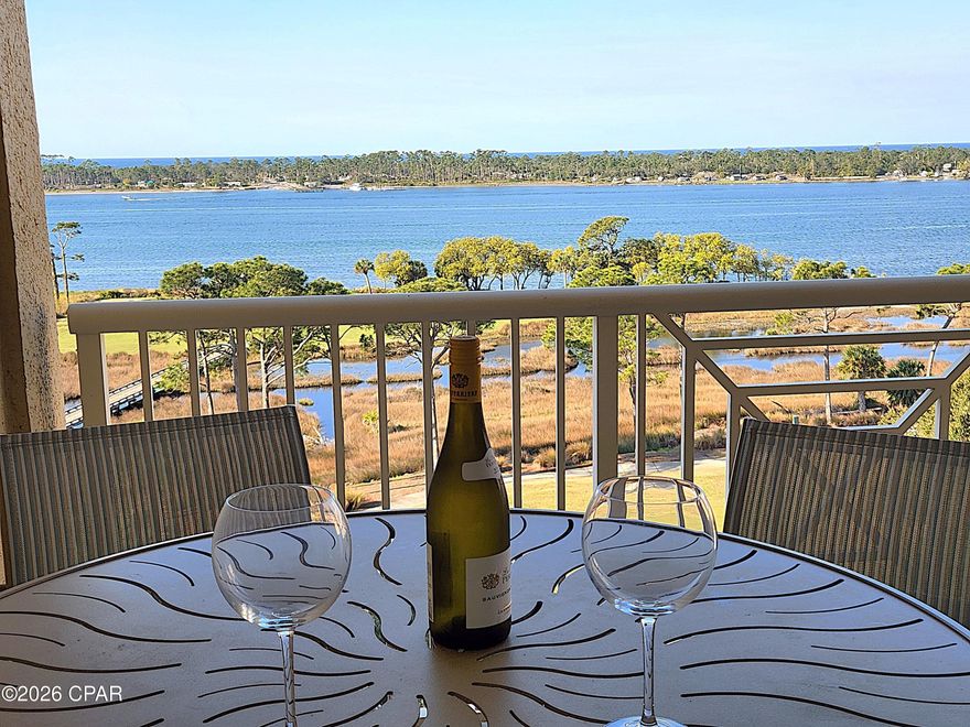 LOCATION, LIFESTYLE, AMENITIES All with stunning WATERVIEWS at The Grand Residence at Bay Point! This rare 2-bedroom, 2-bath, with office/bedroom Penthouse on the 8th floor comes with a deeded garage parking space and climate-controlled storage area. The 1512 sq ft unit features custom cabinets in the kitchen perfect for a chef's tools and storage, ceramic tile flooring, granite countertops, stainless steel kitchen appliances. This unit has 10-foot ceilings throughout, crown molding, modern lighting, updated ensuite bathroom, dual vanities and 2 walk-in closets for his and hers or linen storage. The living room and master bedroom has access to an oversized balcony just perfect for morning coffee or evening sunsets watching wildlife, boats pass by, or dolphin play in Grand Lagoon in front of St. Andrews State Park while overlooking the gulf as well as the golfers on the 4th and 5th hole of the Nicklaus course at Bay Point! The 2nd bedroom features custom cabinets perfect for an in-home office, sewing table or crafting. The resort-style amenities are exceptional for any waterfront condo in Panama City Beach. The Grand Residence offers golf cart parking, large heated pool, hot tub, firepit, grilling area, fitness room, Lanai area with pool and ping pong table, an owner's lounge for community and private parties and a pet area for walking. Bay Point is a golf cart friendly, gated community that features, a newly built Point South Marina with slips for vessels up to 120 feet, 18-hole Nicklaus designed golf course, restaurant with weekly entertainment, tennis courts and 24-hour security.  The location of this unique coastal community is ideal for a primary residence or second home investment as it is located just minutes from toes in the sand on the beach, shopping, waterfront dining and entertainment in Panama City Beach. Schedule your showing today and see for yourself! All information deemed reliable but not guaranteed. Buyer to verify all measurements and details.