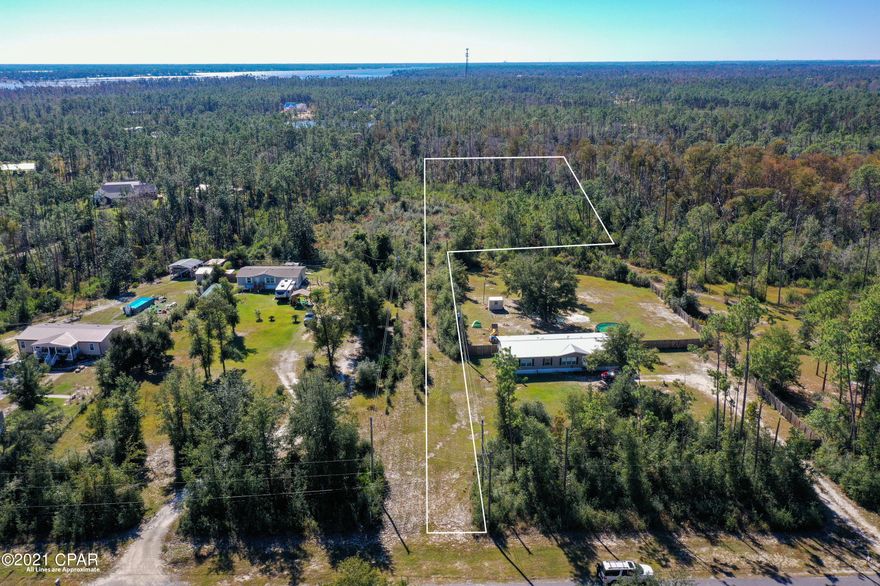 1.69 Acre Residential Parcel sits back from roadway and is currently available.  Come see the possibilities this land for your future.  This opportunity is located in the Southport area and has no HOA fees.  All info, measurements, photos and photo overlays are all approximate, buyer to verify all deemed important.  A land Boundary survey is needed to accurately determine boundaries.  Stop by today to see this secluded private property before its too late.