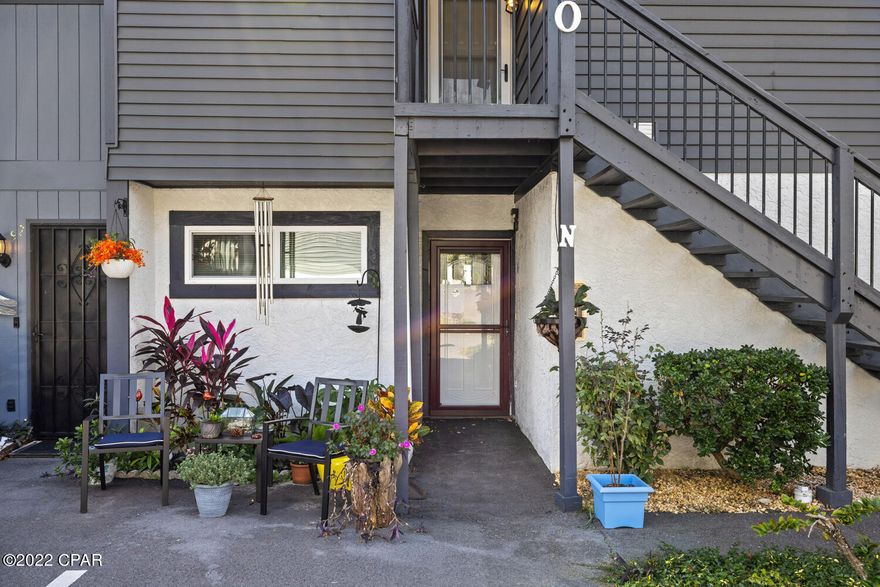 We love this condo! There are so many wonderful characteristics with this unit such as... it is a ground floor unit, split bedroom floor plan with two master suites, a large open living area with sliders that open to an amazing courtyard style, side yard 

( perfect for your pets). This condo unit will make a great short term rental!

This complex has a wonderful pool area and a nice parking area. The location of the complex is brilliant! A block away from the lagoon, only minutes from the beach, shopping and St. Andrews St park. This is a sweet smaller complex, has the perfect name, Shade Tree condominium.Come see!