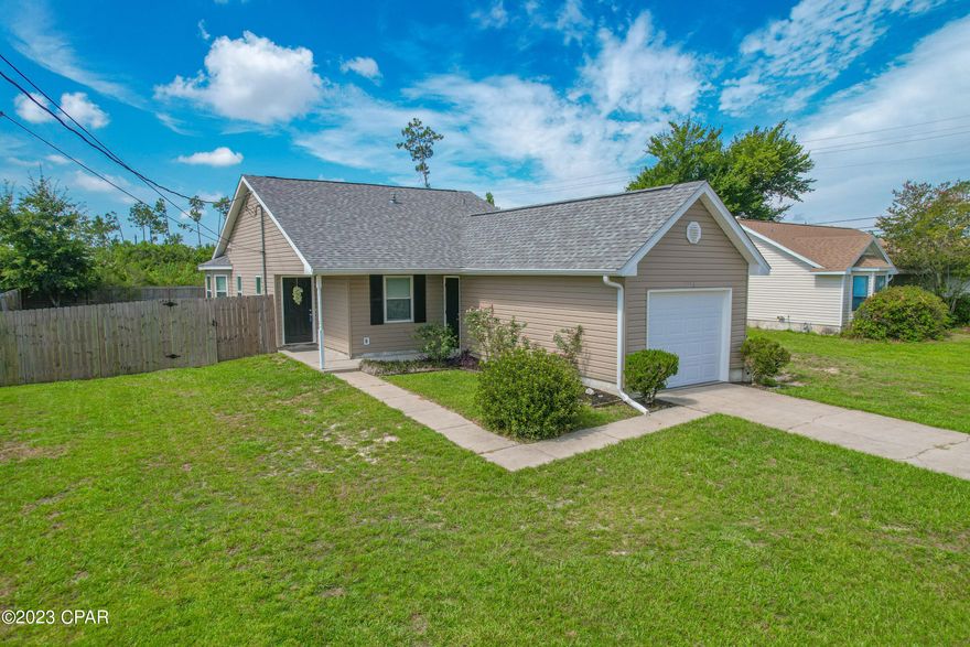 Adorable three bedroom, two bath home centrally located conveniently off Hwy 389, within walking distance to Bay Haven Charter Academy and Mosley High School. Bring the family, because this home is move in ready! . Home has a vaulted ceiling in open living space and great deck area in the privacy fenced backyard perfect for easy afternoons, grilling some dinner for the family. Perfect for the first time home buyer or the person ready to downsize. Call your Realtor for a showing today!