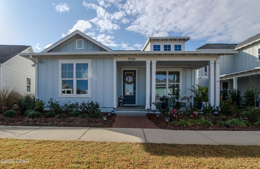 Welcome to 1904 Royal Tern! This charming home features the popular Hillsboro plan in beautiful waterfront Sweet Bay.
This home features a split bedroom plan with 3 spacious bedrooms, 2 bathrooms and a large formal dining room or study. There is LVP flooring throughout with tile in bathrooms. The open kitchen features a slide in gas range, built in microwave, quartz countertops, tile backsplash, designer range hood with gas stove and under cabinet lighting.
The spacious great room extends out to a rear lanai with an outdoor fireplace and a BEAUTIFUL built in OUTDOOR KITCHEN equipped with sink, refrigerator, Blackstone grill, TV and abundant cabinet space! The ideal place for entertaining and watching the game in comfort and style. Also featured are a large paver patio and fenced backyard. There is a extra parking pad in the back alley for extra parking, storage shed, built in storage in garage, Epoxy flooring in garage and an irrigation system!
The primary suite has a zero-entry tile to ceiling shower and double vanities. Walk in custom closet in master bath.
This home features quartz countertops, crown molding, designer lights and decorative doors. Also included are custom woven blinds, 
Sweet Bay is vibrant waterfront community and offers 5 miles of Bayfront shoreline, 2 resort pools, basketball court, walking trails, playgrounds and ample green space. The neighborhood also features the highly rated University Academy (Preschool-8th) and offers a golf cart friendly lifestyle.
Sweet Bay is also home to the Town Center, which feature a Publix, Starbucks, and other eateries with plans for additional dining and retail options.
Also planned is an 11-acre marina with over 100 wet slips and 250 dry boat slips!
Make plans to see this one today!