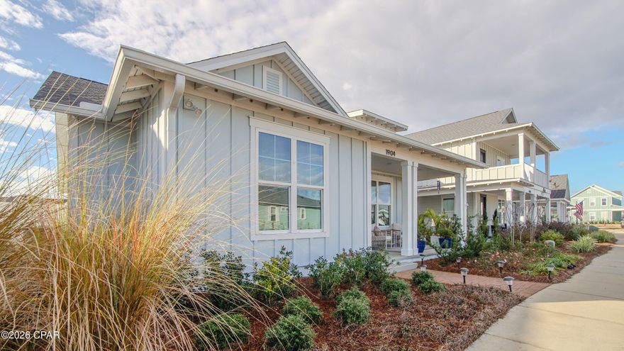 Welcome to 1904 Royal Tern! This charming home features the popular Hillsboro plan in beautiful waterfront Sweet Bay.
This home features a split bedroom plan with 3 spacious bedrooms, 2 bathrooms and a large formal dining room or study. There is LVP flooring throughout with tile in bathrooms. The open kitchen features a slide in gas range, built in microwave, quartz countertops, tile backsplash, designer range hood with gas stove and under cabinet lighting.
The spacious great room extends out to a rear lanai with an outdoor fireplace and a BEAUTIFUL built in OUTDOOR KITCHEN equipped with sink, refrigerator, Blackstone grill, TV and abundant cabinet space! The ideal place for entertaining and watching the game in comfort and style. Also featured are a large paver patio and fenced backyard. There is a extra parking pad in the back alley for extra parking, storage shed, built in storage in garage, Epoxy flooring in garage and an irrigation system!
The primary suite has a zero-entry tile to ceiling shower and double vanities. Walk in custom closet in master bath.
This home features quartz countertops, crown molding, designer lights and decorative doors. Also included are custom woven blinds.
Sweet Bay is vibrant waterfront community and offers 5 miles of Bayfront shoreline, 2 resort pools, basketball court, walking trails, playgrounds and ample green space. The neighborhood also features the highly rated University Academy (Preschool-8th) and offers a golf cart friendly lifestyle.
Sweet Bay is also home to the Town Center, which feature a Publix, Starbucks, and other eateries with plans for additional dining and retail options.
Also planned is an 11-acre marina with over 100 wet slips and 250 dry boat slips! Washer and dryer and all refrigerators stay! A 1-year Home Warranty is included for peace of mind!  Make an appt to see this unique home today!