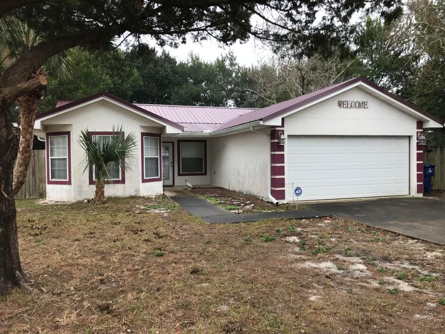 THIS IS WHAT YOU HAVE BEEN LOOKING FOR! Updated, WEST END 3/2 beach house within walking distance to Frank Brown Park, walking trails, a short drive to Pier Park and less than one mile to the World's Most Beautiful Beaches! This home boasts tile floors throughout with carpet in the bedrooms, cathedral ceilings, breakfast bar, lots of widows and natural light, plenty of storage, and a 2 car garage all on almost a 1/4 acre! The roof and HVAC were replaced in 2011. Measurements are estimated, verify if important.