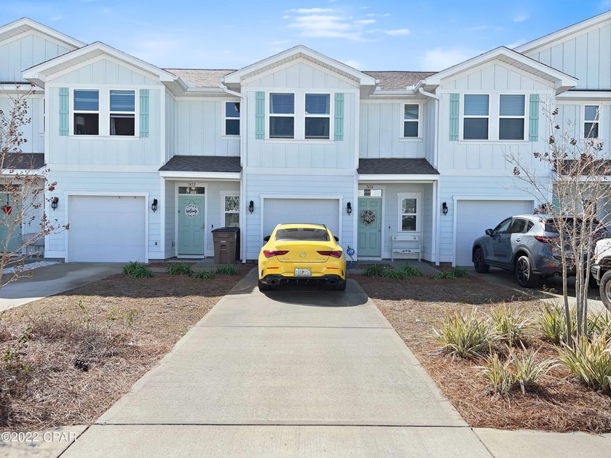 'CURRENTLY UNDER CONTRACT, SELLER ACCEPTING BACKUP OFFERS' Do not hesitate on this one! Hathaway Tomhomes is a very clean and well maintained complex with a beautiful exterior design and short term rental are allowed! Located on the East End of Panama City Beach near the foot of the Hathaway Bridge as well as PCB's brand new sports complex and the new elementary school, The interior features an open concept living space downstairs with a half bath. Luxury vinyl plank flooring, granite countertops, stainless steel appliances, profile cabinets, high ceilings and plenty of storage including a pantry in the kitchen. The second floor includes 3 bedrooms which feature plush carpet and 2 bathrooms that also include granite.