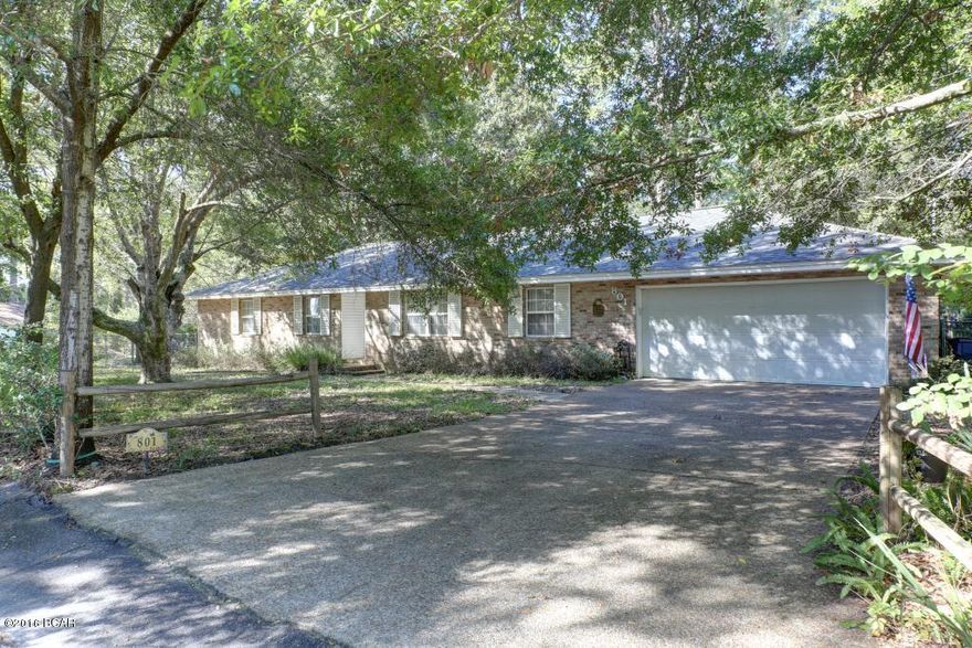 3 BEDROOM-2.5 BATHROOM ALL BRICK HOME ON LARGE CORNER LOT IN PANAMA CITY'S GARDEN CLUB AREA! Brand new 40 year roof recently installed!! INTERIOR: Lots of natural light as you enter the elegant Foyer which leads into a spacious Living Room and formal Dining Room complete with bamboo flooring. Kitchen with Breakfast Bar opens up to Family Room complete with built-in cabinets, fireplace and enclosed & finished rear 20 x 12 screened Patio. Master Suite overlooks the large and landscaped back yard with double vanities and separate elegant pebble base Master Bathroom shower. EXTERIOR: Fenced yard on this double wide lot full of mature hardwood trees and an additional 2 car detached garage, RV/Boat workshop and storage building, fully wired, shallow well sprinkler system and (more) right across the street is the Public Boat ramp for access to Johnson Bayou. All sizes, dimensions, measurements and other listing information should be verified if deemed important. Please watch the Virtual Video Tour and view the included Survey.