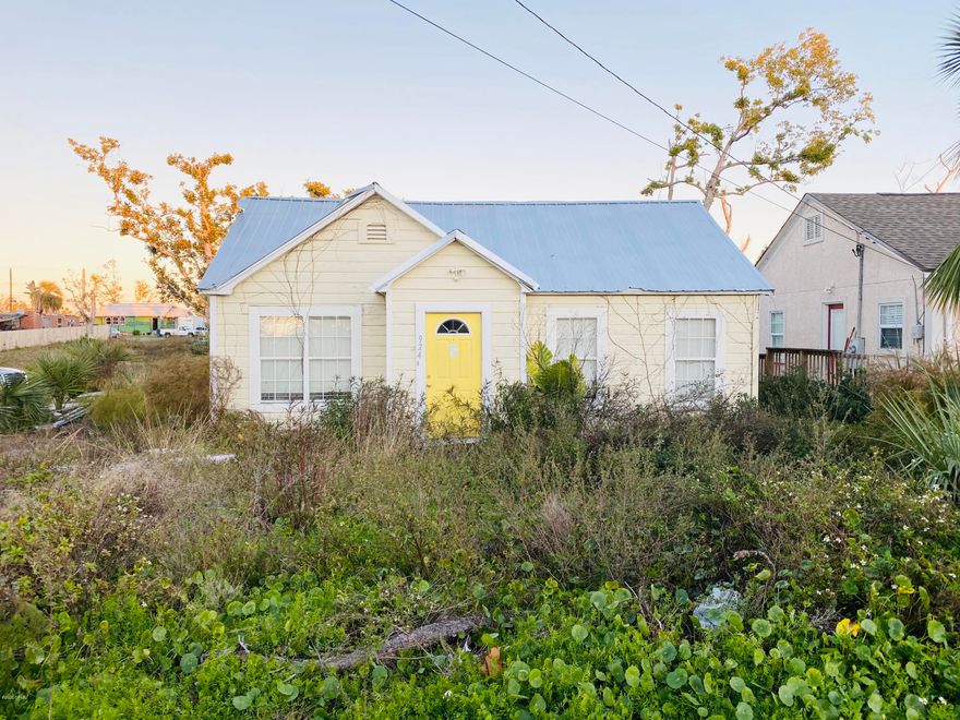 BRING AN OFFER! 2BR/1BA bungalow damaged in Hurricane Michael, located in the up and coming downtown area!  It is not known at this time whether or not home can be saved- however, property can be used for limited light commercial purposes! Property is zoned Mixed Use-1, and is next door to a barber shop. Repair and renovate, or tear down and build anew. Property is unsafe to enter, and unsecured. Please do not use back door to enter.