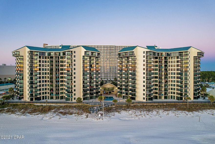 Floor Plan A! - The most spacious floor plan to enjoy amazing beach and sunset views from within the Sunbird Condos. This lovely condo comes fully furnished, making it turn-key and rental-ready! Completely renovated with tile floors throughout, kitchen with modern cabinetry and granite countertops, custom walk-in shower, bathroom vanity, barn door, and all new furniture. The Sunbird Condo is a gulf front, gated complex that offers ample parking, shuffleboard, tennis courts, elevators, laundry rooms, fitness center, and 3 pools, with one being heated. The entire resort and its pools have been through a complete renovation including all new exterior paint, a new roof, new Trex decking, grills, and high-impact windows and doors, making it feel like a brand new resort! The deck around the central pool should be completed just in time for spring. Located right next door to Pineapple Willy's restaurant with several attractions, shopping, and restaurants within walking distance. All measurements are deemed correct, buyers should verify if they are important.