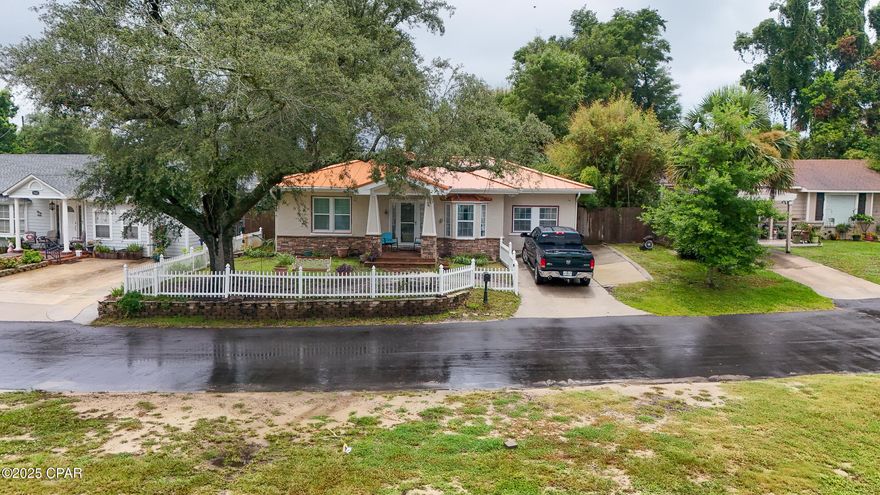 ''''CURRENTLY UNDER CONTRACT, SELLER ACCEPTING BACKUP OFFERS'''' Experience the ultimate waterfront lifestyle with this captivating property at 1045 La Paloma Terrace, located in the vibrant Panama City Market. This beautiful home boasts an impressive array of features that make it ideal for both a relaxing getaway or a full-time residence.

Nestled along the serene waterfront, the property includes a boathouse equipped with a lift and a spacious dock tailor-made for entertaining guests. Imagine enjoying the stunning sunsets by the water or setting out for a quick boat ride with unparalleled Gulf access just minutes away.

Inside, the home has been thoughtfully renovated, offering 3 comfortable bedrooms and 2 modern bathrooms. Music enthusiasts will appreciate the dedicated music studio, while the large storage shed right out the back door provides practical space for all your storage needs.

Set amidst beautiful landscaped grounds with mature trees, the property exudes a tranquil charm. Yet, all the excitement of downtown Panama City is just a Short distance away by car. Revel in the city's nightlife, restaurants, entertainment, and year-round fun activities and events.

Convenience is at your doorstep with Sacred Heart Bay Medical located just two blocks away. Whether you are seeking a peaceful retreat or an exciting urban lifestyle, this property caters to every desire. Embrace the opportunity to own this remarkable waterfront haven and call today to schedule your personal showing!