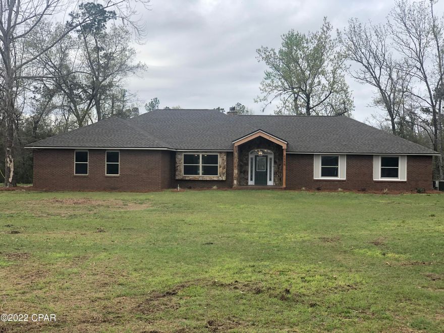 Gorgeous completely renovated waterfront home on 12.64 acres. If you want privacy this property offers it. The majority of the property is wooded except around the home. The foyer opens to the living room w/ vaulted ceilings and a large brick fireplace. The kitchen features a vaulted ceiling, large island w/ gas cooktop & hood, wall oven, plenty of storage, refrigerator, built-in desk area, dining & breakfast room spaces. The large master suite includes his/her closets, double vanity, & a large tiled shower. Three sets of french doors on the back of home tend to draw you out onto the 900 sq ft deck overlooking the 2+ acre pond that's loaded w/ fish. Property includes a large 45'x30' metal barn & an abundance of wildlife. Survey has been completed.