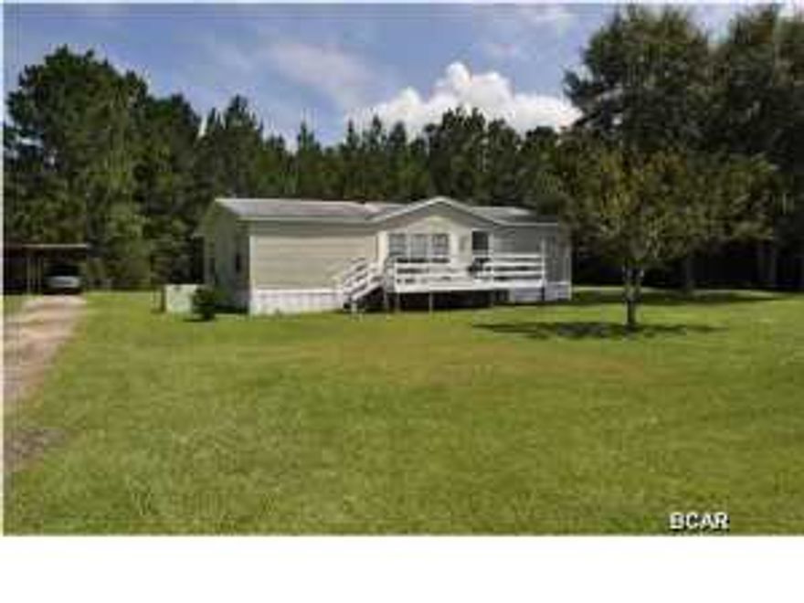 Peaceful and quiet is how the seller describes living in this Bayou George property. Located on a big fenced lot overlooking a pond, this manufactured home is immaculate and move-in ready. The home features a split-bedroom floor plan, a welcoming front deck and a screened porch off the back where you can enjoy the sights and sounds of nature. There's even a pond behind the property. Parking is a breeze thanks to a detached two car carport and there is also a storage shed with a lean-to. You're only 10 minutes from shopping centers, golf courses, hospitals, schools and more! All info is approx and must be verified by Buyers if important.