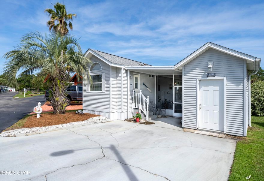 LAKEFRONT HOME with BEAUTIFUL VIEWS AVAILABLE at Emerald Pointe Resort. This one bedroom, one bath beauty comes complete with a screened lanai OVERLOOKING the private lake and boardwalk. It has an open floor-plan, separate 7x9 storage building outside with work bench, roof installed 7/19, APPLIANCES updated 2021 in kitchen, washer, dryer, stove and HVAC updated since 2023, and it's being sold furnished! This home would be an excellent primary residence, vacation home or rental property. Emerald Pointe is located in the heart of Panama City Beach close to restaurants, shopping, and the world's most beautiful beaches. It's is a golf cart friendly, gated community that offers a large clubhouse, exercise room, 2 pools (one heated seasonally), hot tub, private lake w/boardwalk and shuffleboard courts.