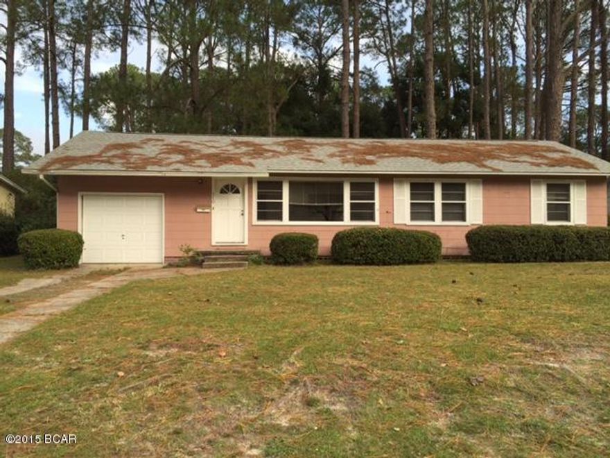 Cove Charmer, this 3 bedroom 1 bath home is centrally located in the heart of the desirable Cove. Home had a new roof in 2012 and new a/c, heater in 2013.  Home is priced to sell and is perfect for an investor wanting to flip a Cove home.  Living area is very spacious, original hardwood flooring, one car garage and a beautiful large back yard. This one won't last long call for your private showing today. All ages, sizes including sq. ft. Are approx. measure if important.