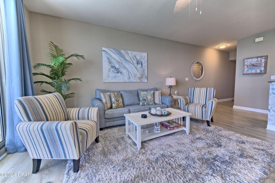 CURRENTLY UNDER CONTRACT, SELLER WILL CONSIDER BACKUP OFFERS.   VIEW OF THE GULF...beautifully renovated, this 1BR/2BA unit at the SHORES OF PANAMA features one of the few oceanfront units with a private, unobstructed view of the beach.  Fabulous sunrises, sunsets, lavish landscaping, huge lagoon pool and every amenity imaginable, await you when you open the door to your private escape.  Walking distance to Pineapple Willies and Walmart...This unit comes with a deeded parking space.  WHAT ARE YOU WAITING FOR?